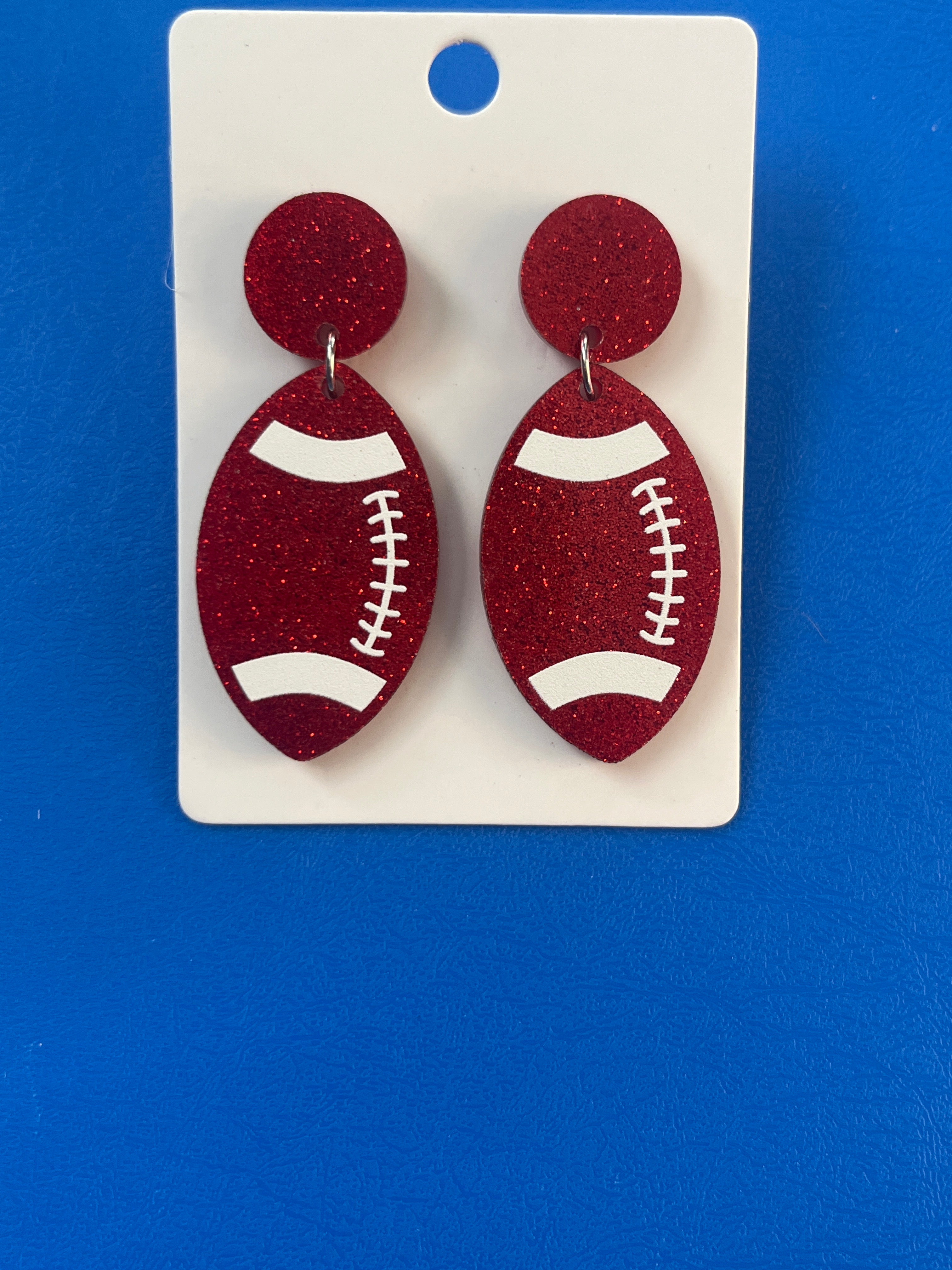 Football 🏈 dangles red glitter