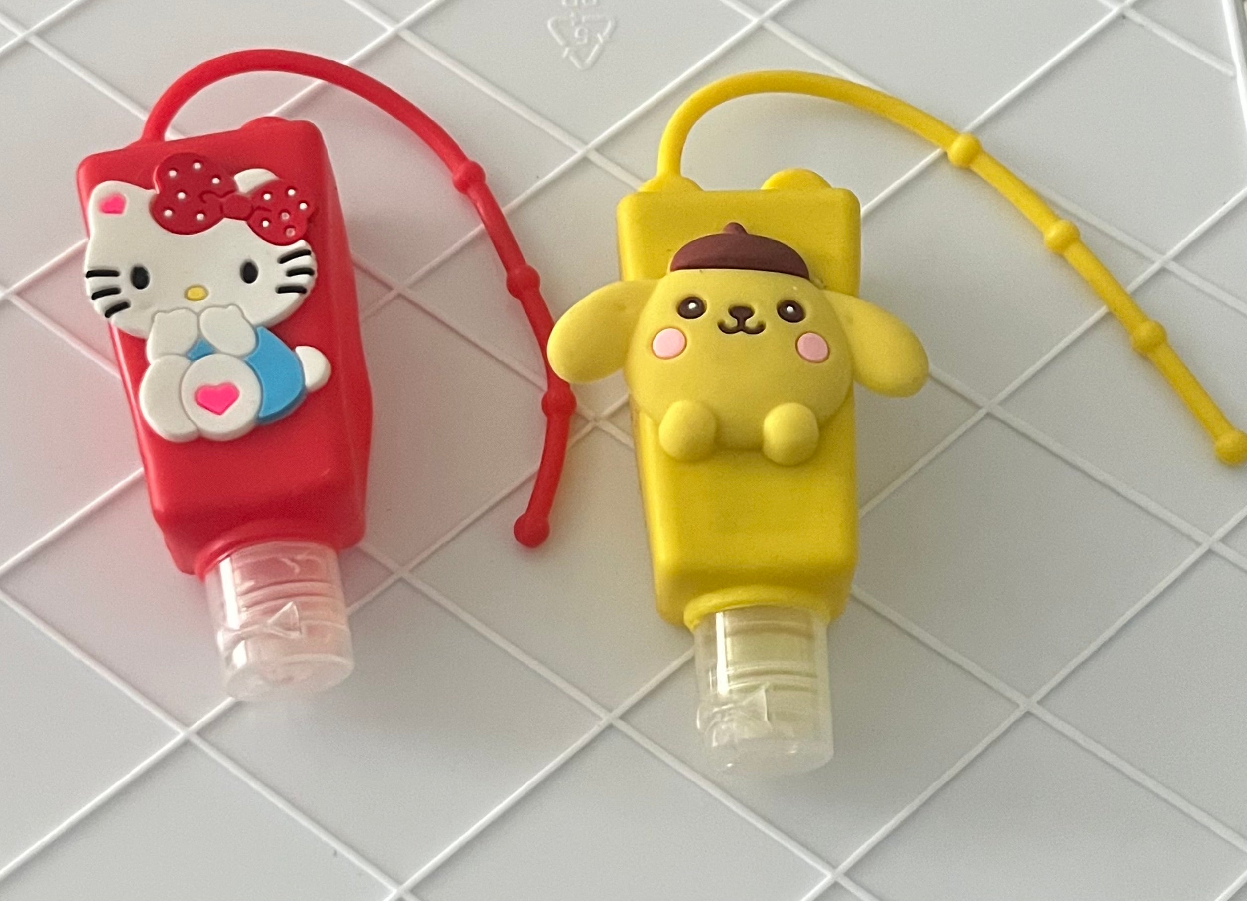 Hand sanitizer w/holder
