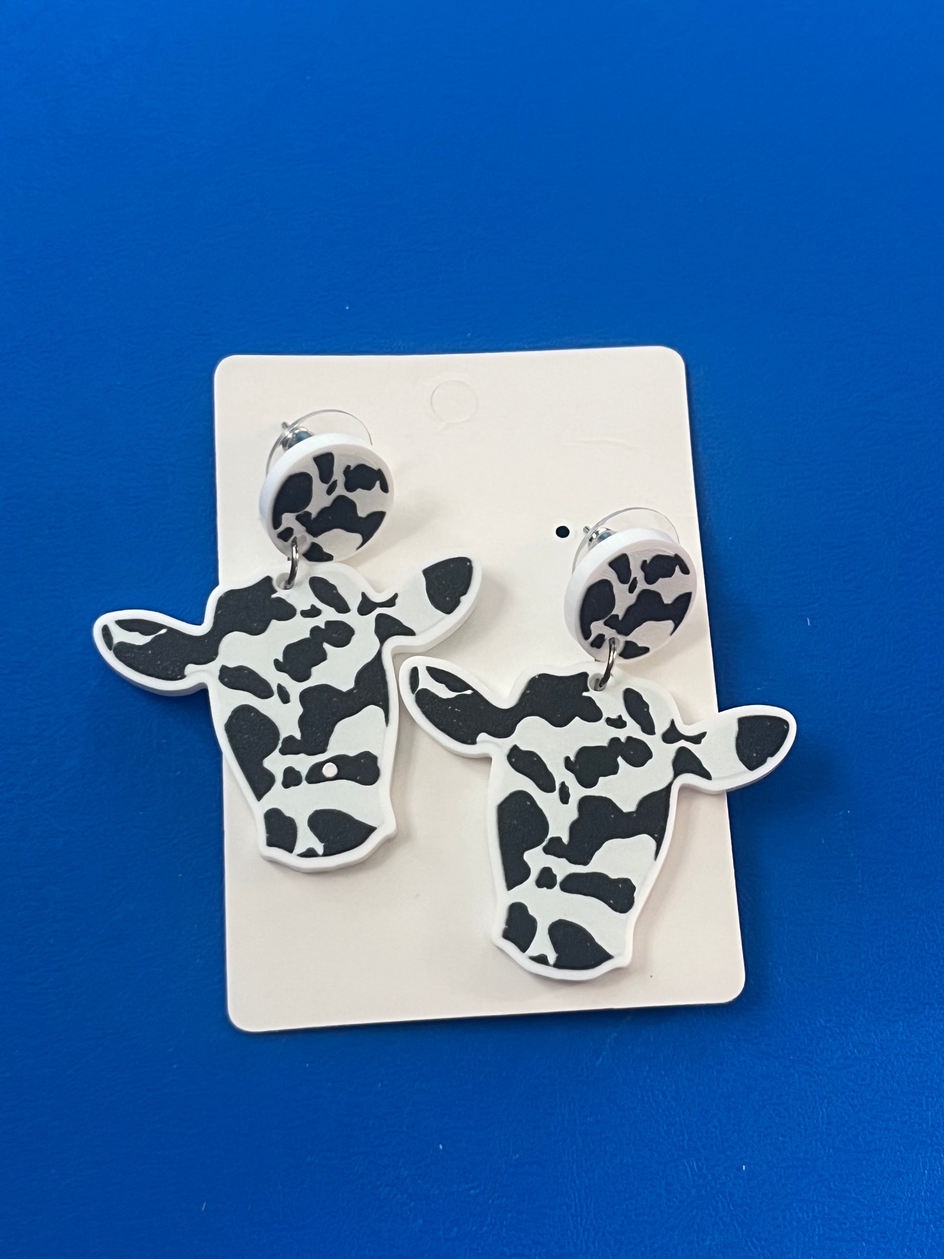 Cow print dangles